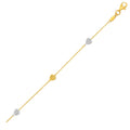 14K white gold anklet with textured heart shapes in two-tone gold
