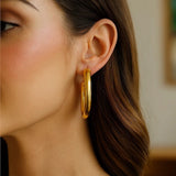 14K Yellow Gold Oval Omega Hoops thumbnail 3