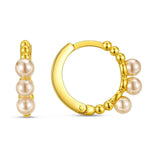 14k Yellow Gold Pearl Huggie Earrings thumbnail 1