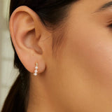 14k Yellow Gold Pearl Huggie Earrings thumbnail 3