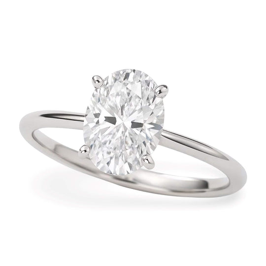 10K white gold ring with 1 oval diamond stone in solitaire setting