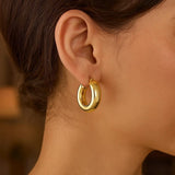 14k Yellow Gold Medium Puffy Hoops thumbnail 3