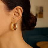 14k Yellow Gold Medium Puffy Hoops thumbnail 5