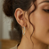 10K Two Tone Gold Oval Twist Hoop Earrings thumbnail 2