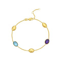 14K yellow gold bracelet with oval gold links and rounded beads