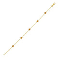 14K yellow gold station bracelet with faceted citrine stones