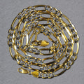 14K yellow gold Figaro chain with solid pave links at 7.00 mm width