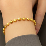 14K Yellow Gold Polished and Satin Pebble Bracelet (6.00 mm) thumbnail 4