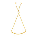 14K yellow gold curved bar lariat bracelet with smooth 0.80 mm profile