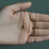 1.0mm 14K Yellow Gold Octagonal Shiny Snake Chain thumbnail 3