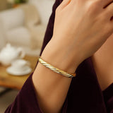 14k Yellow Gold Twist Bangle (5.30 mm) thumbnail 7