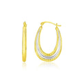 10K two-tone gold graduated textured oval hoop earrings
