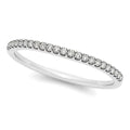 14K white gold ring with round diamond stones in a scallop setting band