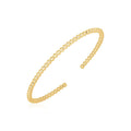 14K yellow gold beaded cuff bangle with 3.00 mm high polish rail