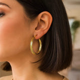 14K Yellow Gold Full Twist Large Hoops Earrings thumbnail 5
