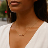 14K yellow gold cross pendant necklace with a polished finish thumbnail 1