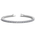 14K white gold tennis bracelet with round diamond stones in a continuous line