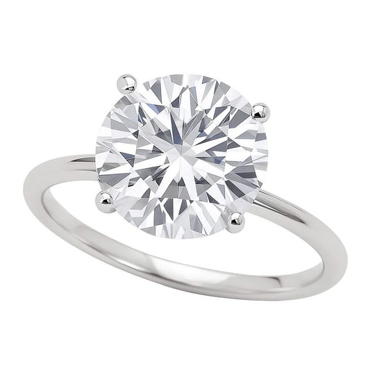 10K white gold ring with one round diamond solitaire stone