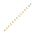 14K two-tone gold bracelet with textured oval links measuring 6.35 mm