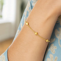 14k Yellow Gold Rolo Chain Bracelet with Puffed Heart Stations (3.30 mm)