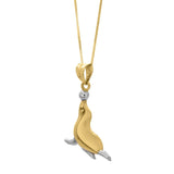 10K two-tone gold seal pendant necklace with raised motif thumbnail 1