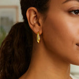 14K Yellow Gold Graduated Oval Hoop Earrings thumbnail 3