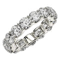 14K white gold eternity ring with round diamond stones around the full band