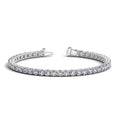 14K white gold tennis bracelet with round diamond stones in a continuous line