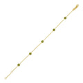 14K yellow gold station bracelet with round peridot stones in bezel settings