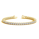 14K yellow gold tennis bracelet with round diamond stones in a linked line thumbnail 1