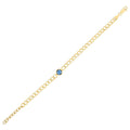 14K yellow gold curb chain bracelet with blue topaz accent stones