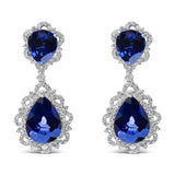 18K white gold drop earrings with blue sapphire and diamond halo stones thumbnail 1
