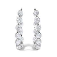 14K White Gold 3 3/4 Cttw Graduating Diamond Oval Hoop Earrings