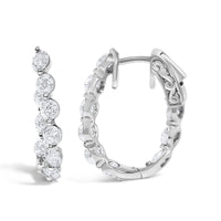14K White Gold 3 3/4 Cttw Graduating Diamond Oval Hoop Earrings