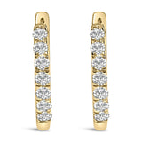 10K gold huggie hoop earrings with round diamond stones set on both sides thumbnail 1