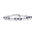 18K white gold bracelet with round diamond and blue sapphire stones
