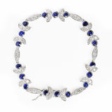 18K White Gold 1 3/4 Cttw Diamond and 3x3mm Round Blue Sapphire Gemstone Floral Link Bracelet (G-H Color, SI1-SI2 Clarity) - Size 7