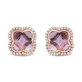 18K rose gold ring with G-H diamond halo and purple amethyst center stone
