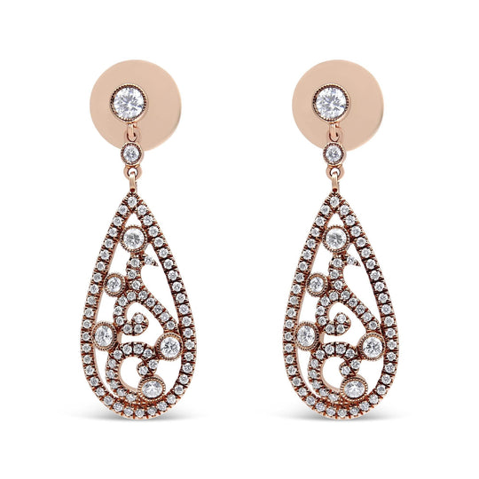 18K rose gold ring with teardrop diamond stones in F-G color VS clarity
