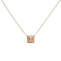 14K yellow gold necklace with matte diamond pyramid pendant