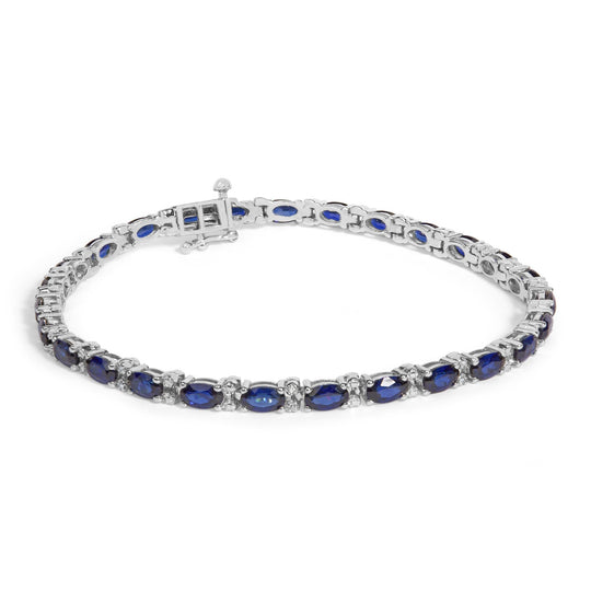 Sterling Silver Alternating Diamond Accent and Oval Blue Sapphire Tennis Bracelet