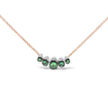 18K rose gold choker necklace with pave diamonds and green tsavorite stones