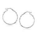 14K white gold hoop earrings with diamond-cut faceted surface