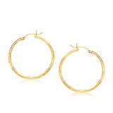 14k Yellow Gold Fancy Diamond Cut Slender Large Hoop Earrings (30mm Diameter) thumbnail 2