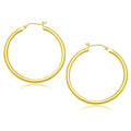 14K yellow gold polished hoop earrings 40 mm with no stones
