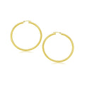 14K yellow gold polished hoop earrings, 25 mm round tube profile