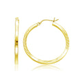 14K yellow gold diamond-cut hoop earrings with faceted gold surface