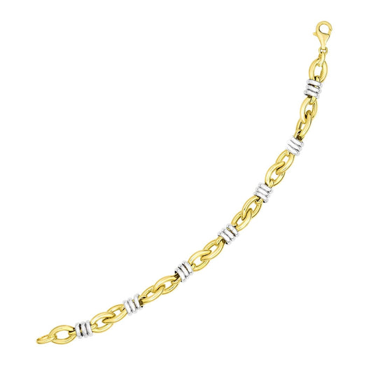 14K two-tone gold link bracelet with marquis-shaped ring-wrapped links