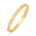 14K yellow gold carved bangle with diamond accents, 6.0 mm width