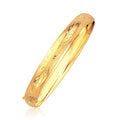 14K yellow gold floral carved bangle, 8.0mm slip-on band
